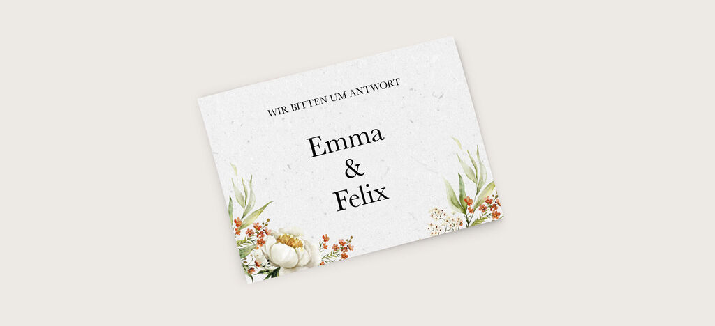 Ein elegantes Einladungskarten-Design mit floralem Muster und den Namen Emma und Felix.