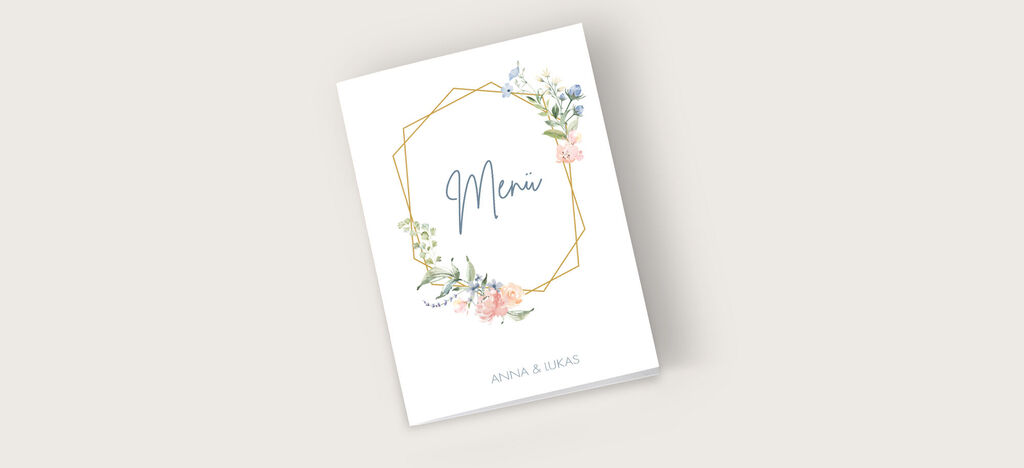 Elegantes Hochzeitsmenü mit floralem Design und Goldrahmen.