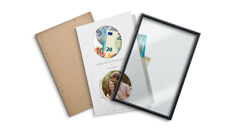 Ein kreativ gestaltetes Fotobuch mit einem Rahmen, der eine Geldnote zeigt. Ein einzigartiges Geschenk für besondere Momente und Lieblingsmenschen.