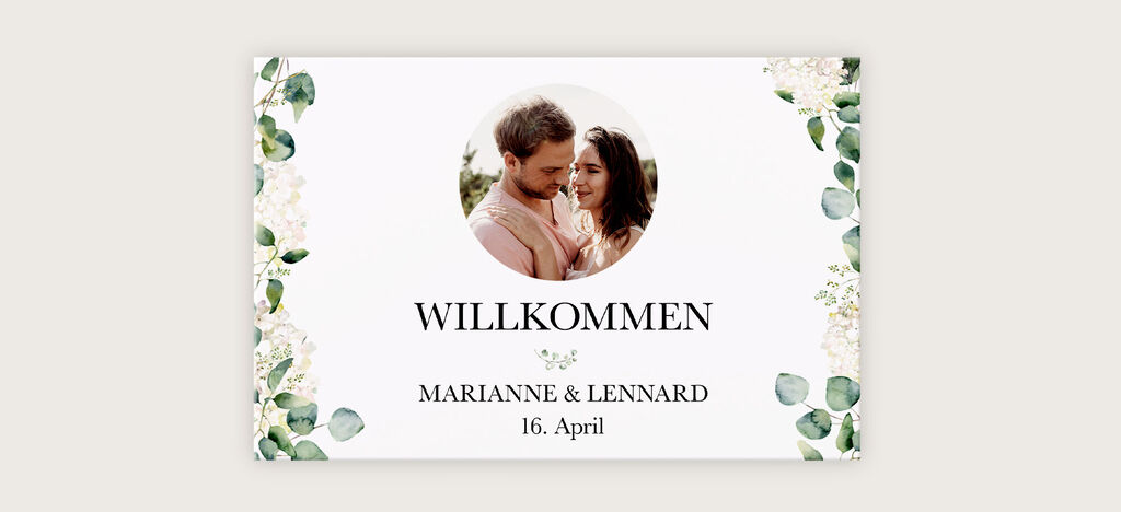 Einladungszitter mit Blumenrand und dem Text 'Willkommen', für eine Hochzeit.