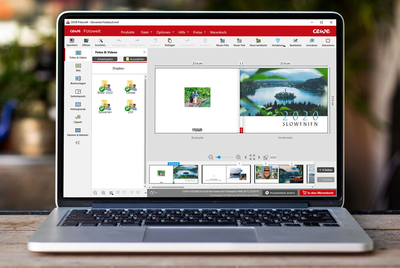 Computerbildschirm mit CEWE Fotobuch-Software und schönen Landschaften